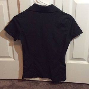 Nike Tops - Women’s black Nike dri fit golf polo XS/S Nike Tops - Women’s black Nike dri fit golf polo XS/S
